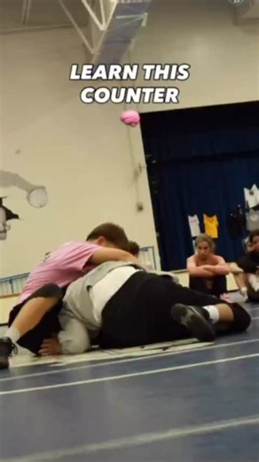 Miami Hawks Wrestling on Instagram: "LEG-IN DEFENSE THAT PUTS YOU RIGHT ON TOP 😤 Most guys panic when someone throws a leg in… you don’t need to. If your mechanics are clean, this position becomes yours. When he throws his left leg in, I immediately collapse that same hip to the left side. That takes away all his pressure. My left foot slides up and I hit a small windshield-wiper motion so my left hip slides down. The whole time, my chest stays pointed toward the mat and my left elbow stays tig