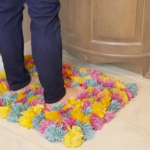 6.5M views · 12K reactions | This fluffy pom-pom rug is the perfect addition to any room—and it's fun to make, too! | Tasty Home | Facebook