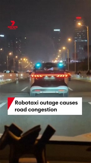 Local police have reported that a "system failure" caused a widespread robotaxi outage in Wuhan, China, on April 1.Multiple vehicles operated by Baidu's Apollo Go were stranded in the middle of roads with their hazard lights flashing. Meanwhile, other vehicles were forced to navigate around the congestion. #robotaxi #baidu #wuhan #china #traffic