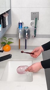 61K views · 445 reactions | Install a toothbrush cup holder like this on your bathroom counter; toothpaste, toothbrush, rinse cup, and cosmetics can all be stored on the wall | MYK | Facebook