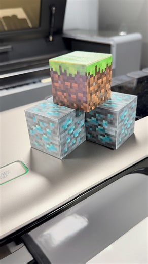 Crafting Table: Level 100. 🛠️🗿 Transforming blank 3D prints into iconic Minecraft blocks with direct UV printing. The detail on the grass and stone is 👌. 🎥:@David Krammer #eufyMake #Minecraft #3DPrinting #uvprinting #minecraftblocks | eufyMake