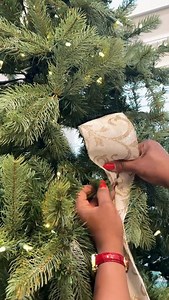 3 ways to Style a Christmas Tree with Ribbon Pt.2 Ensure you use a wired ribbon as always. It makes the process so much easier. I used a 4” wired ribbon here. This ribbon comes in many colors. You can find it in my profile 👆🏾 Style 1 - create loops while using the tree stems to hold each loop in place. Style 2 - to create this high end designer look, create each loop, pinch and twist in place. Use a floral wire to secure all three loops and place in Christmas tree, tie to a stem. Then loop all