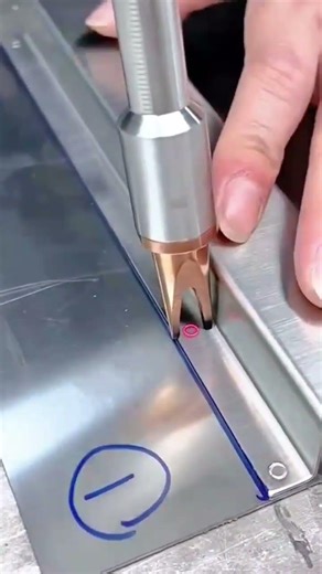 welding two pieces of shiny metal plates together using a modern laser tool #shorts