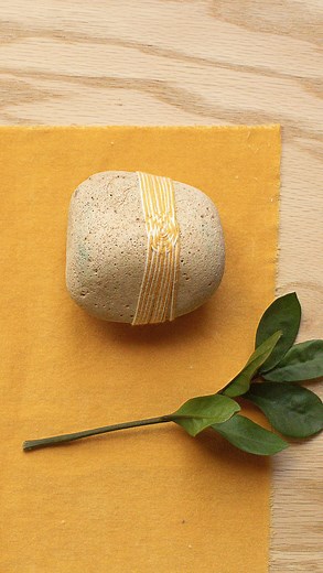 Learn How To Weave | Lindsey Campbell on Instagram: "Like and save if you want to try rock weaving! This is such an easy, great technique. 1. Go on a walk, find a rock 2. Wrap string from one side to the other, looping it in the center 3. Continue wrapping from one side to the other, weaving it around the far side of the loop on each pass The woven parts will create a circle in the center! I used two strings at once, because I liked the look of the stripes on the side. What do you think? I’ve po