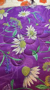 I am having so much fun showcasing different computerized quilting designs with yall! And bonus that I get to do it on such gorgeous fabric! This digital design is from karleeporter.com and it’s called “Crazy Daisy”. The fabric is from @designsbyrr latest recent collection called Bee Haven. I’m using my favorite thread: @sulkythreads 40wt Rayon, and for extra stability, two layers of Warm & Natural from @thewarmco #Quilt #quilting #longarmquilting #prostitcher #computerizedquilting #computerized