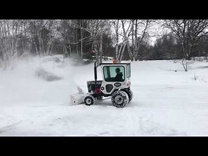1972 Bolens HT 20 blowing snow.