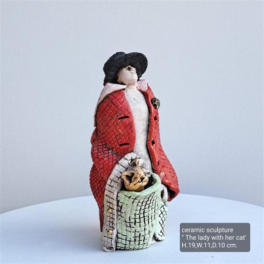 Ceramic Sculpture  Handmade  whimsical  figure with cats .  High 19 cm.