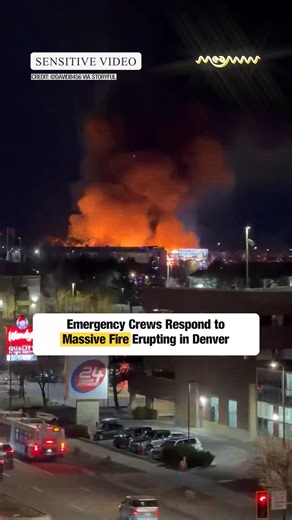 Emergency Crews Respond to Massive Fire Erupting in Denver Emergency crews rushed to the scene of a massive fire in Denver, Colorado, on Friday, January 2. The Denver Fire Department was battling the blaze, which was upgraded to a five-alarm fire, at the intersection of Leetsdale Drive and Forest Street on Friday evening. The Denver Police Department said it was assisting with road closures, with locals advised to avoid the area. According to reports, the fire ignited a building that was under c