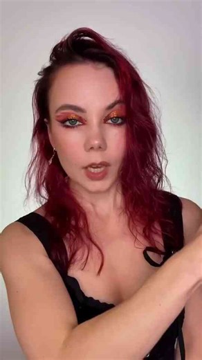 Red makeup look that accidentally gives Terminator vibes