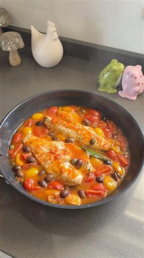 Mediterranean-style sea bass fillet with sauce and cherry tomatoes 🌿#easyrecipes