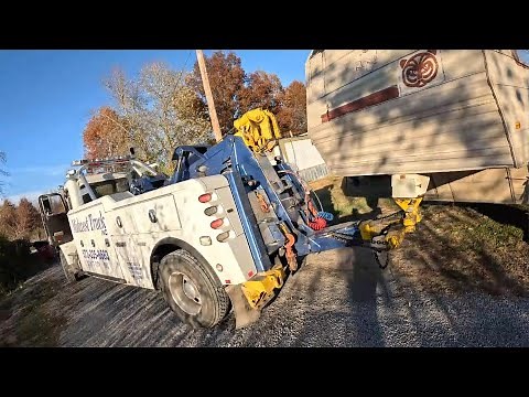 HOW TO TOW A CAMPER WITH A WRECKER!!! THIS ONE TESTED MY DRIVING SKILLS!!