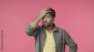Troubled, distressed handsome bearded man slap forehead, facepalm and tousle hair, stuck in complicated situation, feel uneasy about bad thing work, standing indecisive and upset