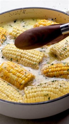 Corn on the cob boiled in a buttery milk bath, infusing it with flavor. After using this technique, you won't want to go back to just water! https://thestayathomechef.com/butter-boiled-corn-on-the-cob/ | The Stay At Home Chef