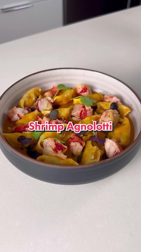Langoustine and Shrimp Agnolotti with Shellfish Tomato Sauce and Leek oil Ingredients: For the pasta: • 100g of ‘00’ flour • 25g of semolina • 3 Egg yolks • 1 whole egg • Olive oil • Pinch of salt For the filling: • 2 Langoustines • 7 Shrimps • 2 Scallops • 4 cubed salmon • 1 Egg white • Chopped chives • Chopped Parsley • Zest of half a lemon • Pinch of salt For the Sauce: • 1 Chopped Shallots • 3 sliced Garlic cloves • 1 small Leek • Langoustine and Shrimp shell and trimmings • 1 whole Calabria