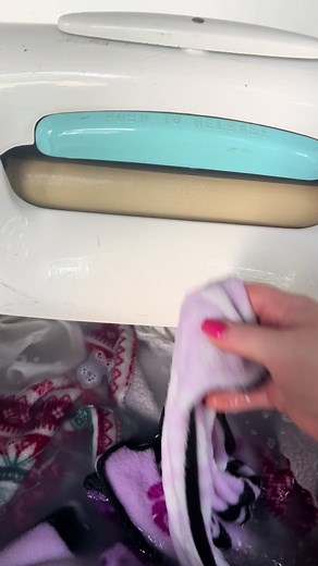 Reviving Blankets with a Wringer Washer