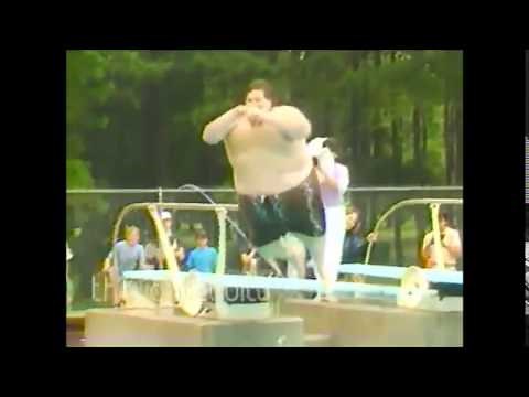 FAT GUY JUMPS INTO POOL