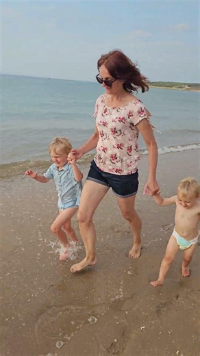 Beata, Matthew & Oliver running Gullane beach in water