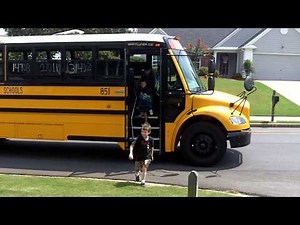 Fenton getting off the bus on his first day of Kindergarten. 2010
