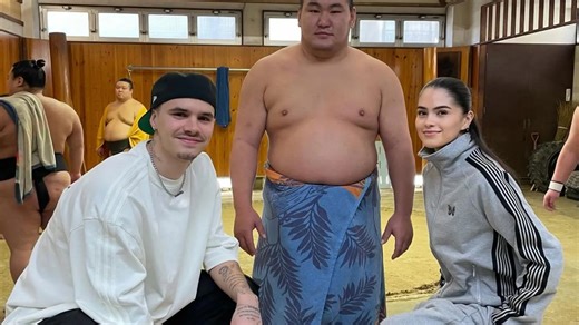Romeo Beckham takes on sumo wrestler with girlfriend Kim amid family feud