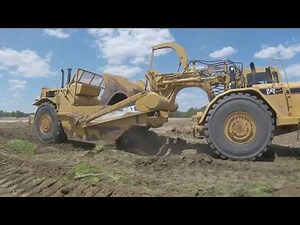 CATERPILLAR 627G SCRAPERS WORKING