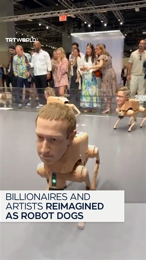 A unique art installation titled Regular Animals, curated by artist Mike Winkelmann, drew attention at the Miami Beach Convention Center on December 3 for its uncanny depictions of prominent figures. The display featured robotic dogs fitted with wax heads of Jeff Bezos, Elon Musk, Mark Zuckerberg, Andy Warhol and Pablo Picasso. The robots were also programmed to print photographs reflecting the distinctive worldviews of each character. | TRT World