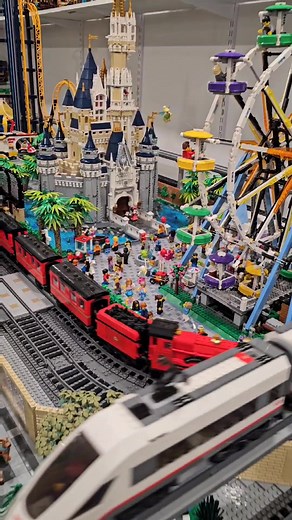 Detailed LEGO Amusement Park with 294 Minifigures and Moving Attractions