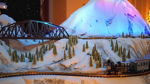 Looking for something festive to do? Come explore spectacular model trains circulating through a bustling city, a charming snow-covered valley, and a glowing aurora night! | The Franklin Institute