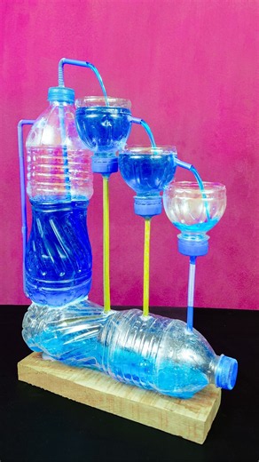 How to make a free water fountain with plastic bottles at home