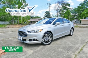 💗💗 2013 Ford Fusion Titanium 💗💗 🗺️ Navigation 💺 Leather ⭕ Alloy Rims 📷 Backup Camera 💻 LCD Screen 👆 Push Button Start 🔥 Heated Seats ↻ Remote Start ✅ Only 139k Miles ⛽ Over 30mpg Highway 👪 5 Passenger Capacity! 📞 Bluetooth ✅ Power Locks 🎴 Power Windows 🚔 Power Mirrors 💺 Power Seat 📀 CD Player ✅ Cruise Control 🎶 In Steering Media Controls 👉 Get Approved Now: https://MallardMotors.com/Approved 👈 Questions? Message, Call or Text: 870-639-9200 - #TrustTheDuck Located @ Mallard Mot
