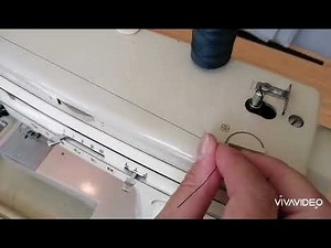 How to thread a Singer 522 Sewing Machine