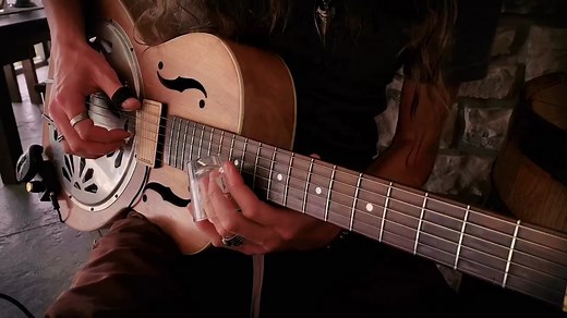 Vintage Acoustic Slide Guitar on the Back Porch