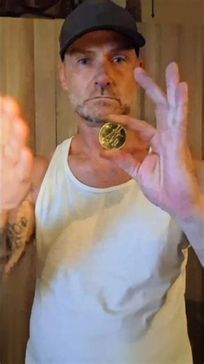 Coin turns into a playing card. #impossible #magic