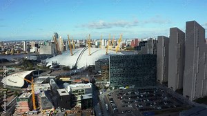 Aerial bird's eye view of the iconic O2 Arena near isle of Dogs and Emirates Air Line cable car in London, United Kingdom