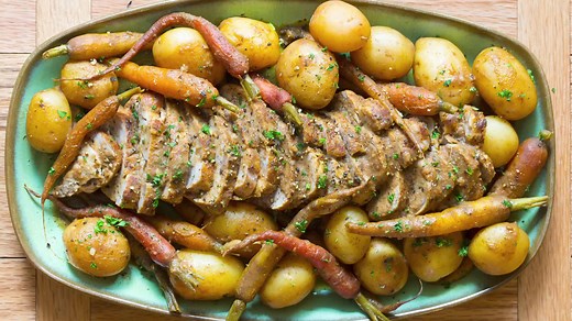 Crock Pot Pork Loin with Vegetables: An easy slow cooker pork loin recipe with potatoes, carrots, and onions in a rich tangy gravy. Full recipe here! https://www.aspicyperspective.com/crock-pot-pork-loin-with-vegetables/ | A SPICY PERSPECTIVE