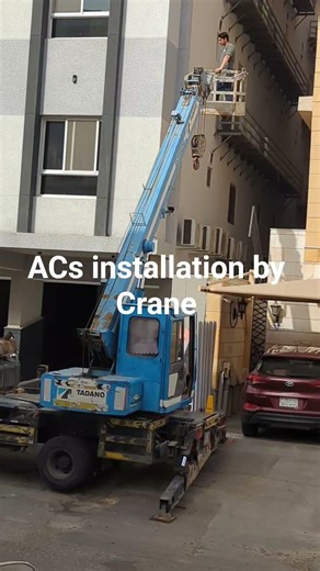 Building Construction #installation #airconditioner #highrise #crane