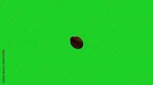 American football spinning in the air on a green screen background