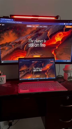 Prompt : Build a full-screen, dark-themed hero section for a volcanic tourism brand called Ignis, using React 18 + TypeScript + Vite + Tailwind CSS and lucide-react for icons. The signature feature is a cursor-following spotlight that reveals a second image through a soft circular mask on top of a base image. Match every detail below exactly.Base image BG_IMAGE_1 is a dark cooled volcanic rock with glowing red cracks. Reveal image BG_IMAGE_2 is bright blazing orange flowing lava. Root wrapper is