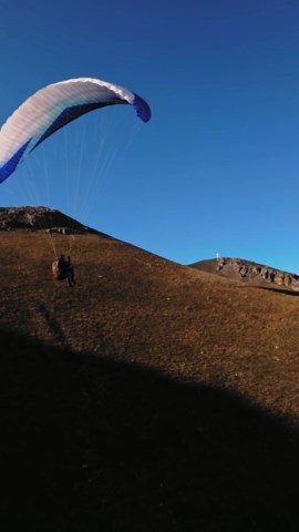 Paragliding Over Landscapes: Mountains to Seas.