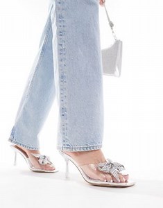 Simmi London Wide Fit Ashleigh clear mid heeled mules with embellished bow in silver | ASOS