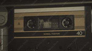 Cassette tape player rolling, close up shot. A vintage music template video, with a natural color aesthetic