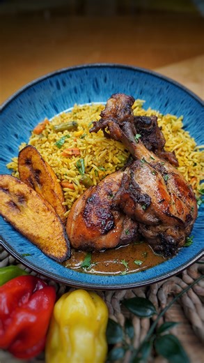 Kay on Instagram: "NEXT LEVEL CARIBBEAN STYLE FRIED CHICKEN AND YELLOW SEASONED RICE 🇯🇲🍗🥵😤🤑🏆🤩😮‍💨🥰🎇💥. Bursting with the island flavours. Chicken drumsticks butterflied then seasoned in Caribbean seasoning then cooked on low in coconut milk, thyme, scotch bonnet and seasonings. Then fried to nice perfection. With the leftover sauce I made a gravy and paired it with a turmeric seasoned rice. Talk about OUTSTANDING flavours, I was truly blown away. Used @walkerswood green seasoning and 