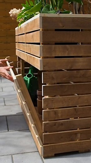 Adding hidden storage underneath my planter box #storage #planter #diy #planterbox #woodworking #magnets Full video and plans 👉 link in profile