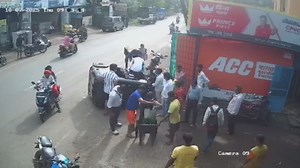 Rickshaw overturns while trying to avoid stray dog running into road