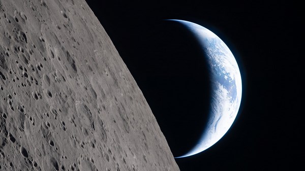 See Earthset and Solar Eclipse Images Captured by Artemis Crew