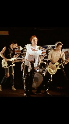 The Vivienne Westwood Archives on Instagram: "Sex Pistols ‘God Save The Queen’ in 1977! Sid Vicious was wearing the ‘Vive Le Rock’ shirt, Johnny Rotten was in the ‘Destroy’ shirt and Steve Jones was wearing a knit sweater all from the Seditionaries brand. I can’t make out of Paul Cook was wearing but also believe it was a shirt made by Vivienne. Video from @sexpistols! #thewestwoodarchives #viviennewestwood #archive #fashionarchives #fashionarchive #70sfashion #sexpistols_official #malcommclaren