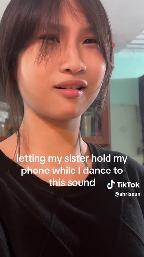 Disgusted facial expressions when handing phone to sister for TikTok