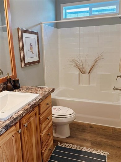 The Spruce is a 3 🛌 2 🛁 1,458 sq ft home available for you to tour now. Imagine evenings on this porch watching the sunset. | Factory Direct Homes