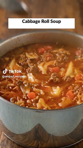 Cabbage Roll Soup Ingredients 1 lb ground beef 2 teaspoons olive oil 1 small onion, finely diced 2 teaspoons minced garlic 4 cups coarsely chopped green cabbage 2 carrots, peeled and sliced 4 cups beef broth 3 (8 oz) cans tomato sauce ½ cup uncooked long-grain rice 1 bay leaf 3 tablespoons brown sugar Salt and black pepper, to taste 2 tablespoons fresh parsley, chopped How to Make It 1. Heat the olive oil in a large pot over medium-high heat. Add the ground beef and season with salt and pepper. 