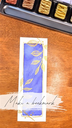 17 reactions | A small craft for a very real problem—making bookmarks because we can’t be trusted to remember the page!  Using @lamycanada ink in Royal Blue to set a solid background for our bookmark. Gold detailing using @finetec gold watercolor in Arabic Gold to add some lineart leaves and outline and tada!!! You have yourself a lovely handmade bookmark! ✨ • • • #handmadebookmarks #lamyink #finetecwatercolors #stationerylover #thepaperyglebe | The Papery | Facebook