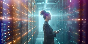 Successful Female Data Center IT Specialist Using Tablet Computer, Turning Augmented VFX Visualization on Server Farm Cloud Computing Facility